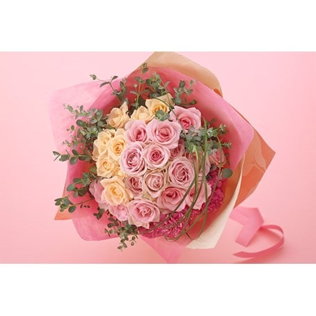 Elegant hand-tied bouquet mainly with roses