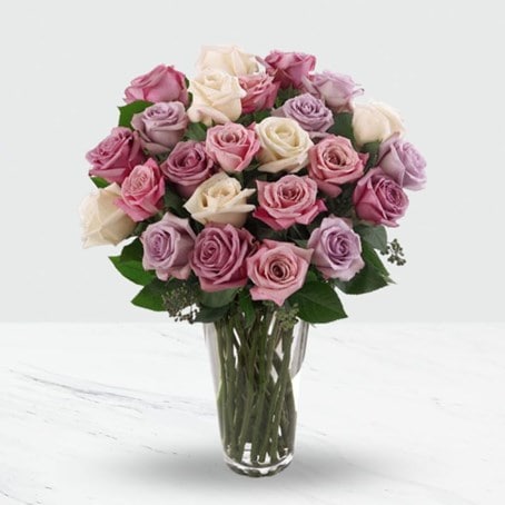 24 Pink and purple roses in a vase